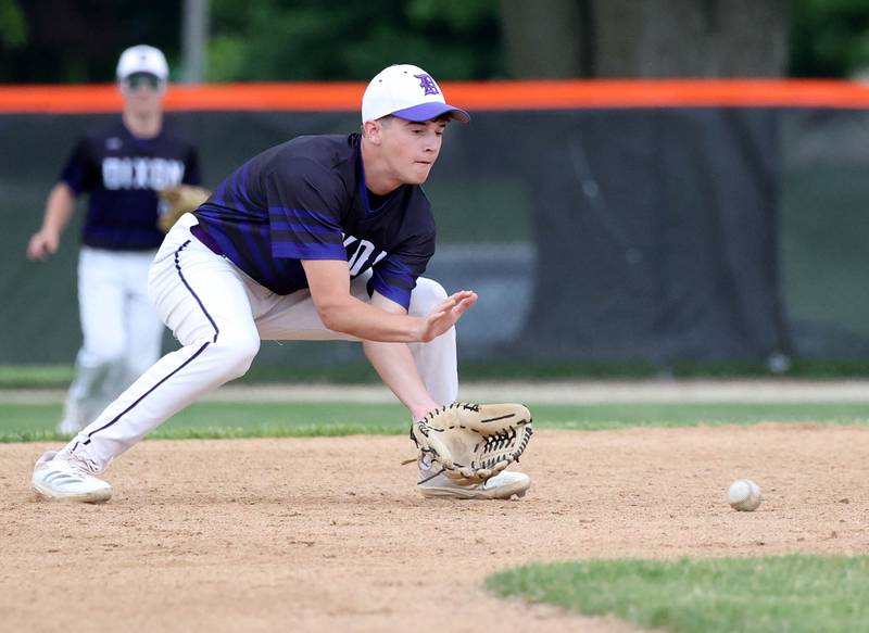 Dixon’s Kellen Haenitsch fields a ground ball at second Thursday, May 29, 2025, during their Class 3A regional semifinal game against Sycamore at Freeport High School.