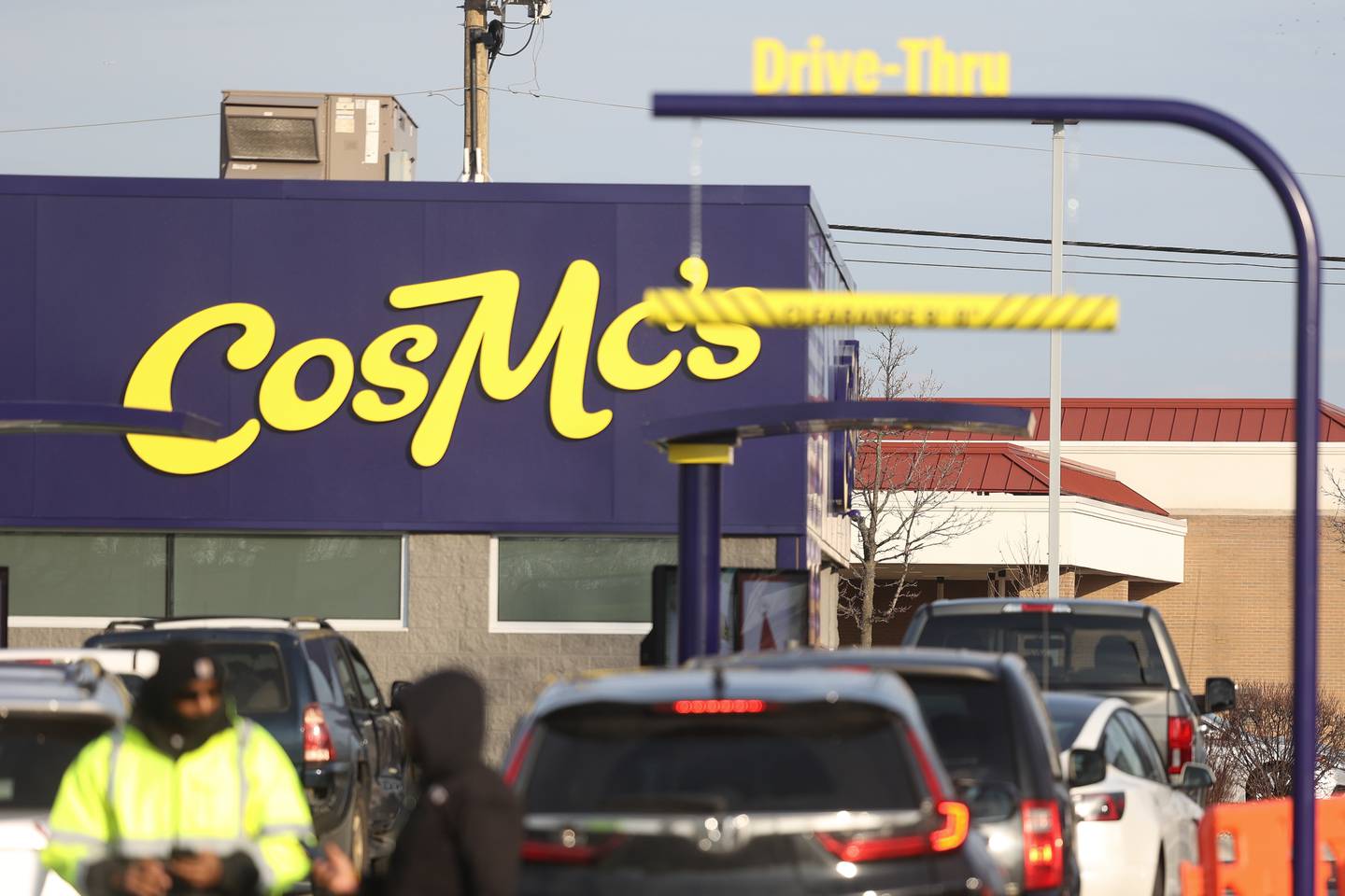 Vehicles pull up to CosMc’s, McDonald’s first small format beverage driven concept drive-thru restaurant, on Friday, Dec. 8, 2023, in Bolingbrook.