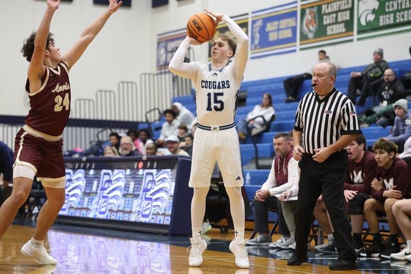 Plainfield South’s Brayden Ablin puts up the outside shot against Morris on Wednesday, Jan. 28, 2026 in Plainfield.