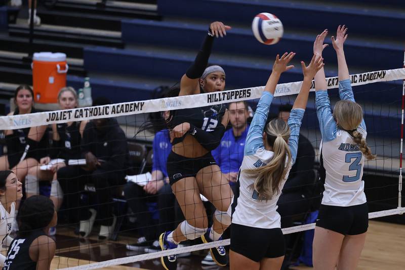 Lincoln-Way East's Tamia Maddox hits a shot against Joliet Catholic on Monday, Sept. 23, 2024 in Joliet.