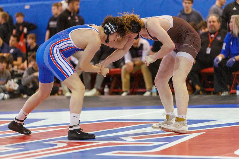Marmion's Daniel Skura and Mt. Carmel's Kellan Breen  competes in the 175 lb match  at the Marmion Class  2A Dual Team Sectional on Thursday, Feb. 5,2026 in Aurora.