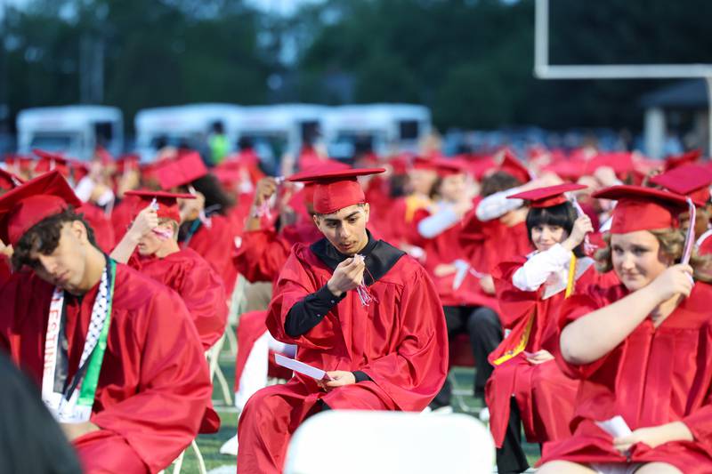 A graduate reacts to his tassel becoming detached while turning it during the Bradley-Bourbonnais Community High School commencement ceremony on Thursday, May 21, 2026.