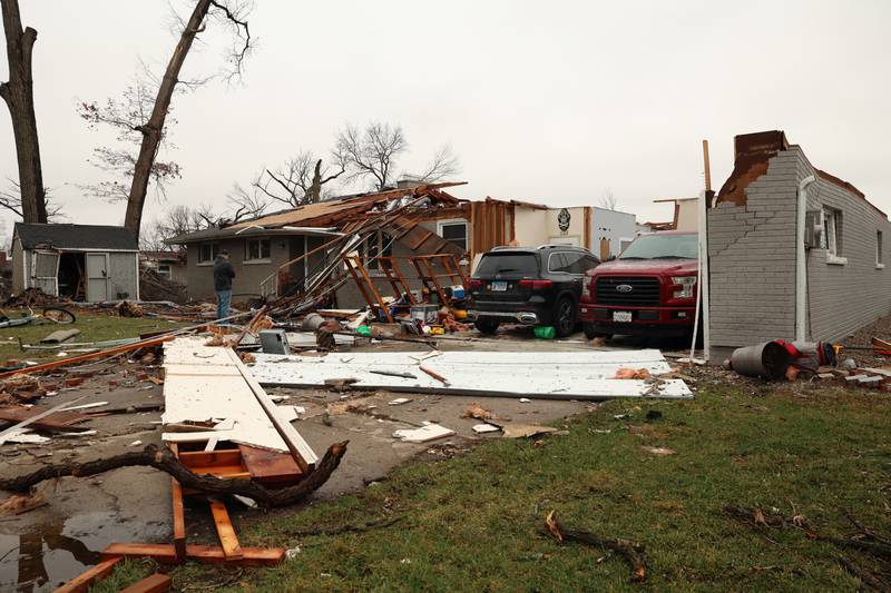 Much of the roof and some exterior walls are missing at the home of Dave Herberger and Emily LaVoie along Elmwood Drive in Aroma Township on Wednesday, March 11, 2026, following the March 10 tornado in Kankakee County.