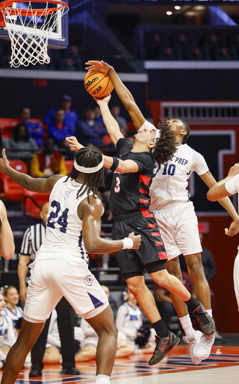 Benet's Jayden Wright (3) is fouled by DePaul College Prep's Blake Choice (10) on his way to the hoop during the IHSA Class 4A boys basketball state semifinal Friday, March 13, 2026 at the State Farm Center in Champaign.