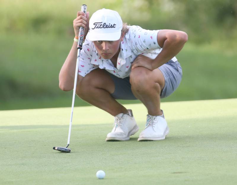 Wyatt Novotney eyes up a put during the Illinois Valley Mens Golf Championship Tournament on Sunday, July 27, 2025 at Spring Creek Golf Course in Spring Valley.
