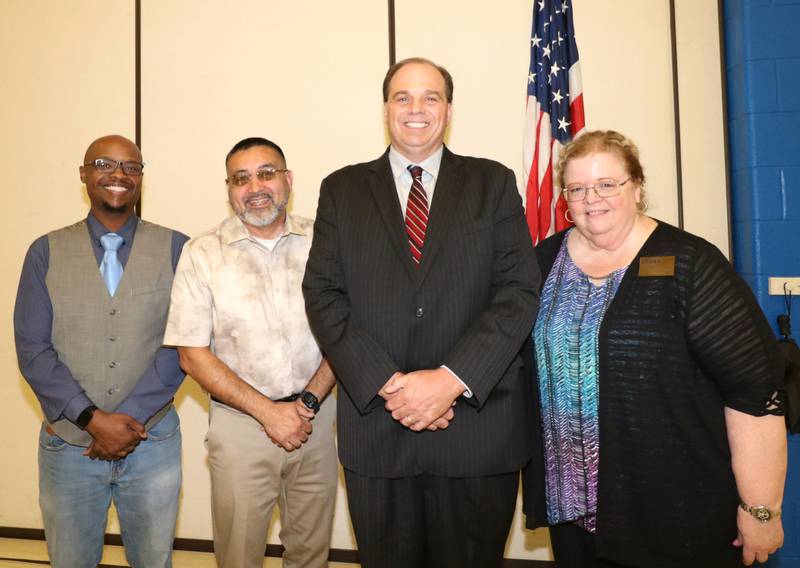 Joliet Public Schools District 86 Board of School Inspectors President Elvis Madison, Jr., Vice President Jesse Smith and Superintendent Dr. Theresa Rouse welcome Dr. Matthew Wilkinson.