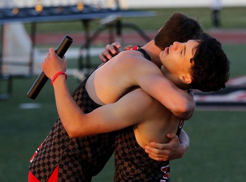 Huntley’s Vincent Costa and Zach Rysavy  celebrate winner the 4 x 200 meter relay during the Huntley IHSA Class 3A Boys Sectional Track and Field Meet on Thursday, May 22, 2025, at Huntley High School.