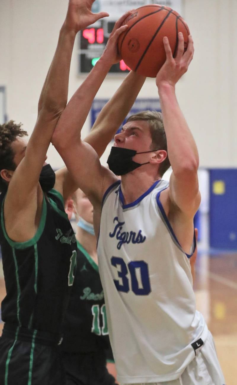 PHS senior Mack Williams posts up against Rock Falls Saturday night at Prouty Gym.