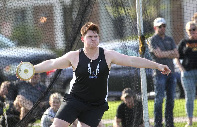 St. Charles North’s Paolo Gennarelli competes in the discus throw during the Kane County Boys Track and Field Invitational at Geneva High School on Monday, May 9, 2022.