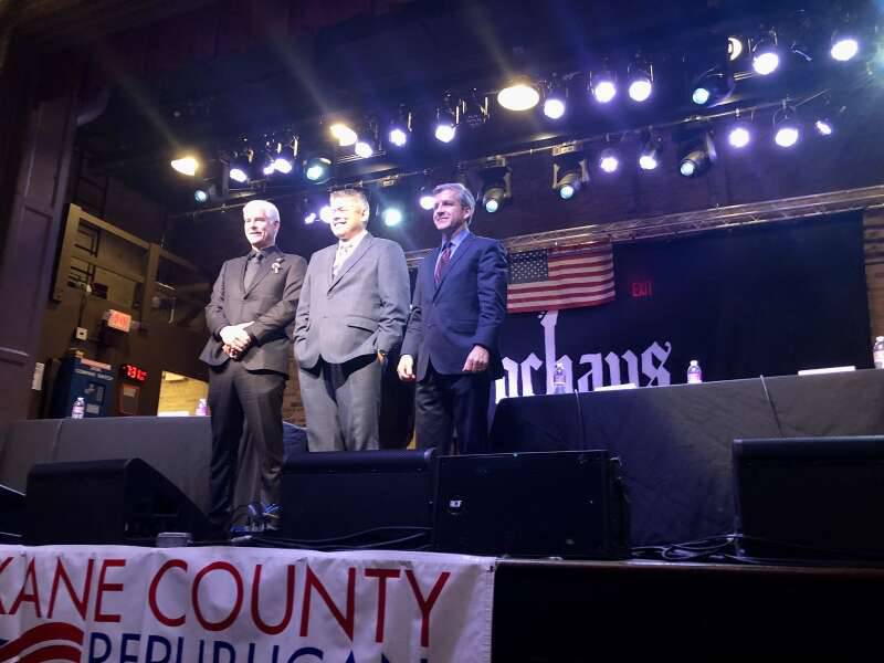GOP candidates, from left, James Mendrick, Aaron Del Mar and Ted Dabrowski take in the crowd Monday after finishing a forum organized by the Kane County Republican Organization.