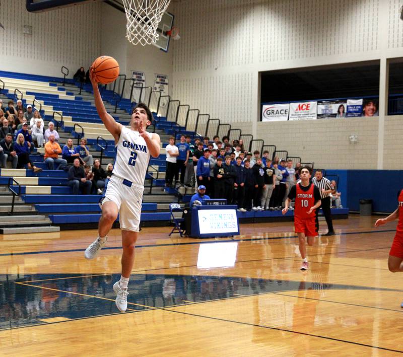 Geneva’s Gabe Jensen gets the ball to the basketball during a game against South Elgin on Monday, Nov. 25, 2024 in Geneva.