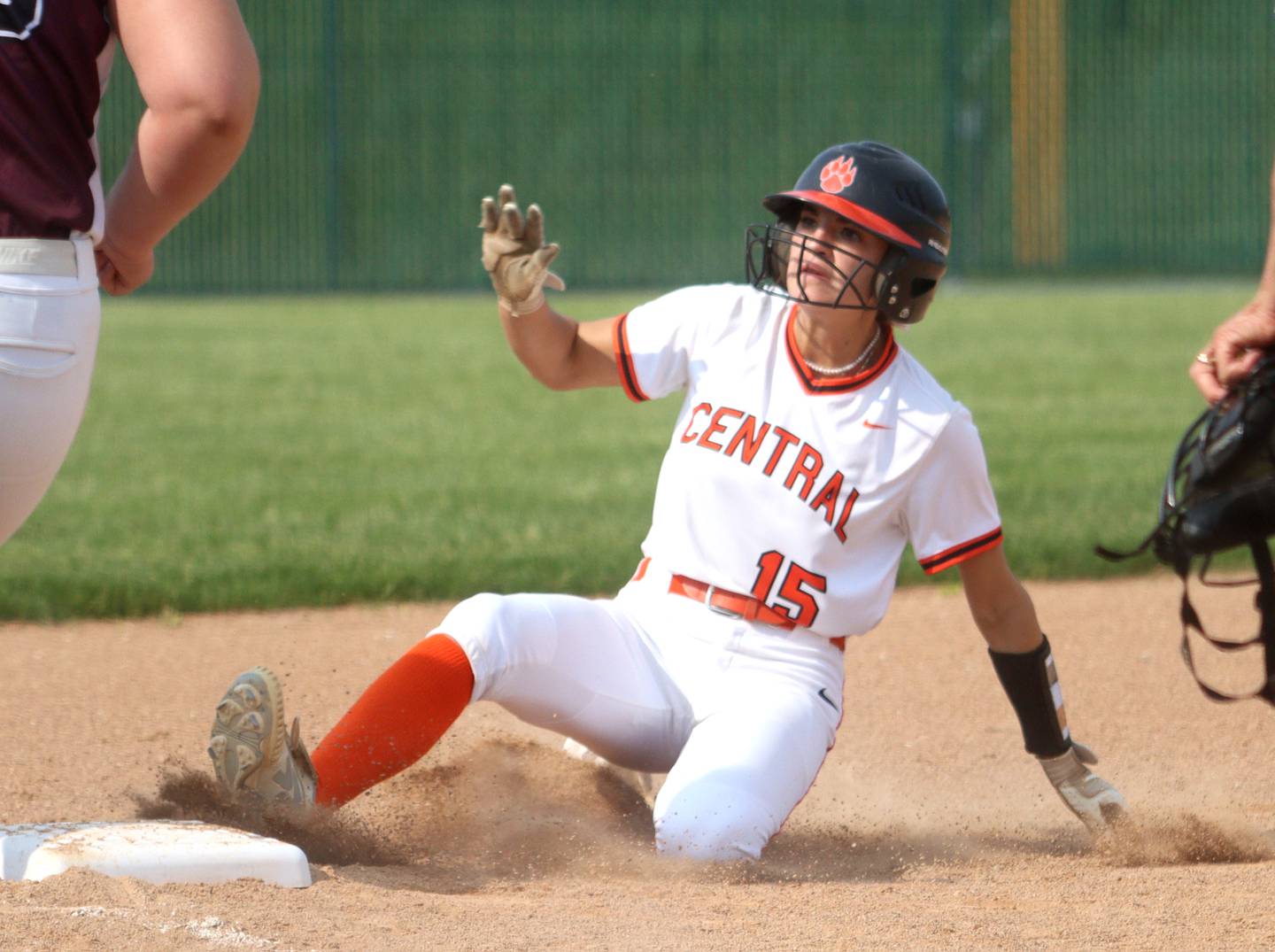 Crystal Lake Central’s Gianna Carone slides safely at third base against Prairie Ridge in Class 3A Regional softball action at Crystal Lake South Wednesday.