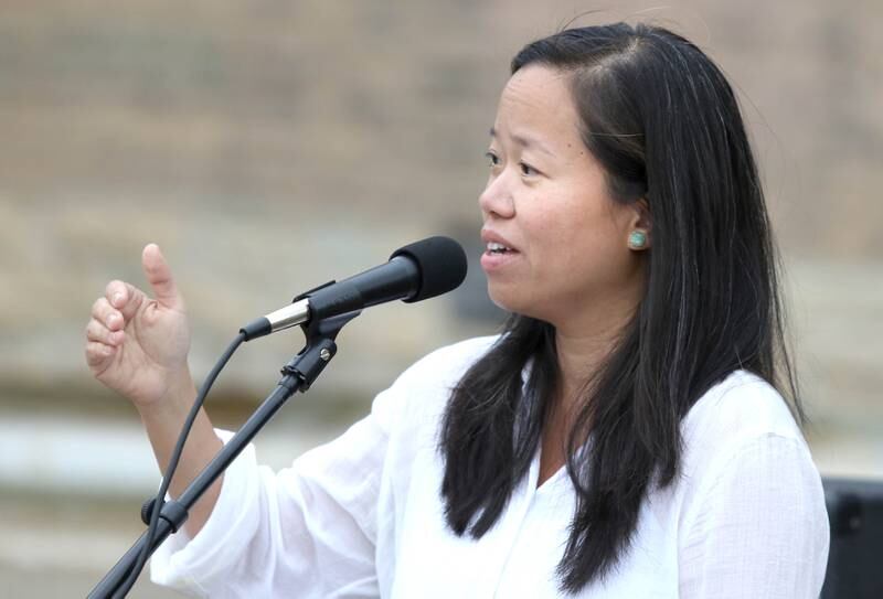 Shaw Local July 2021 file photo – DeKalb resident Linh Nguyen, a past president of The League of Women Voters of DeKalb County, speaks during a Deadline for Democracy rally Thursday at Memorial Park in DeKalb. Nguyen is running for DeKalb mayor in 2025.