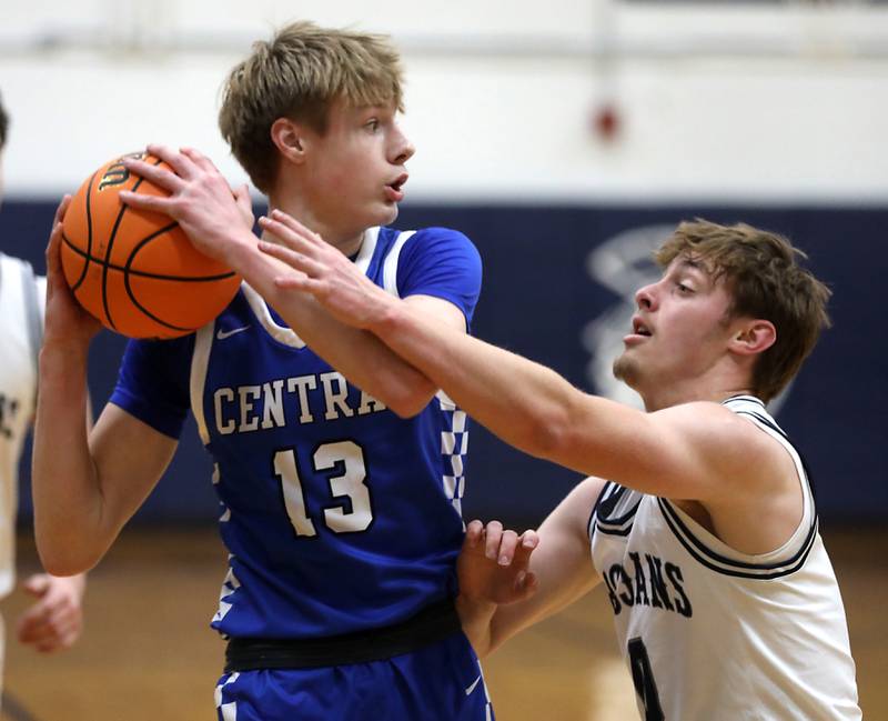 Burlington Central's Declan Wilson is guarded by Cary-Grove's Brandon Freund during a Fox Valley Conference  boys basketball game on Wednesday Jan. 7,  2026, at Cary-Grove High School, in Cary.