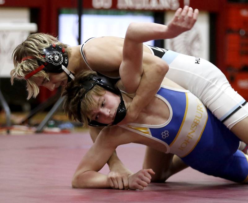 Marian Central’s Austin Hagevold tries to control Johnsburg’s Chase Vogel in the 113-pound championship match of the IHSA 1A Marengo Wrestling Regional on Saturday, Feb. 8, 2025, at Marengo High School.