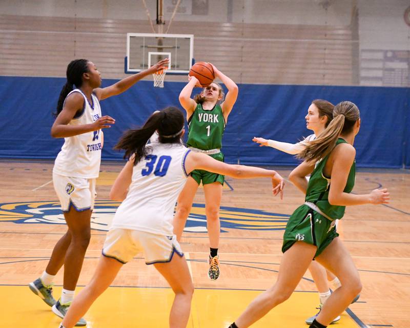 York Mariann Blass (1) makes a shot in the first quarter while being defended by Lyons Township defenders on Friday Feb. 3rd at Lyons Township High School.