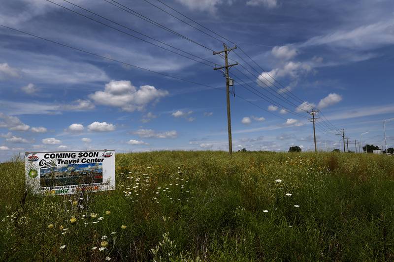 A sign announcing a new travel center in the I-90/Route 23 corridor on Tuesday, July 26, 2022. A year after Marengo's mayoral race drew attention to development of the I-90/Route 23 corridor, both city and county officials are optimistic that the area could seen be a hub of both industrial and commercial activity.