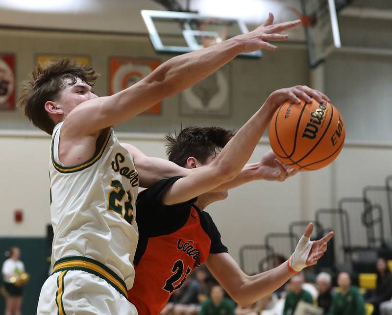 Crystal Lake South's Nick Stowasser battles with Crystal Lake Central's Aidan Watson for a rebound during an IHSA Class 3A Crystal Lake South Regional boys basketball semifinal game on Wednesday, February, 25, 2026, at Crystal Lake South High School.