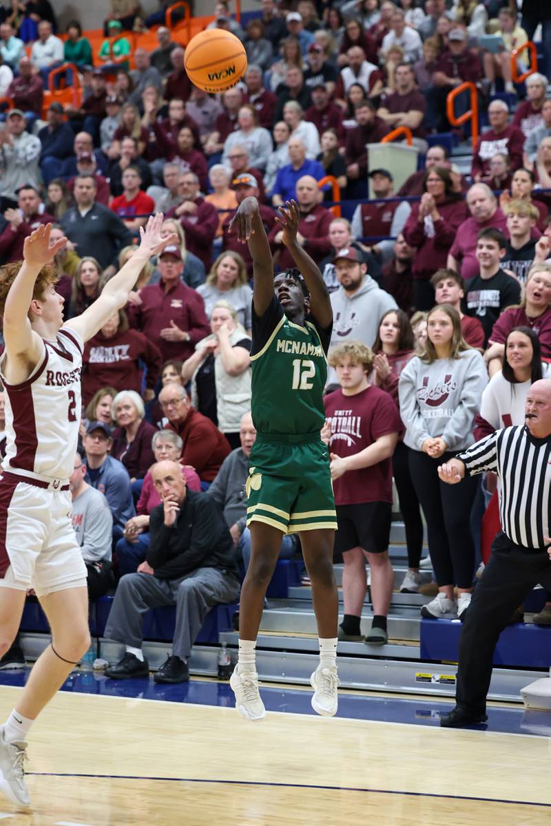 Bishop McNamara's Corey Hathaway shoots a 3-pointer during the Fightin' Irish's 77-70 loss to Tolono Unity in the IHSA Class 2A Pontiac Supersectional on Monday, March 9, 2026.