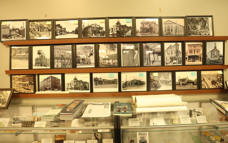 A view of vintage photos in a display case on Tuesday, March 31, 2026 at the Peru City Hall. The Peru Historical Society has collected the memorabilia. They are looking for items to donate to the growing collection. The group meets the last Tuesday of each month inside Peru City Hall at 6:30p.m.
