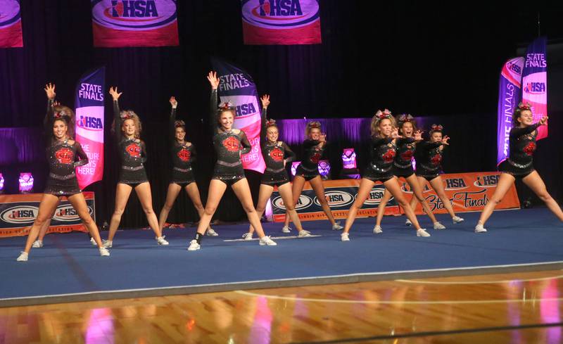 Members of the Crystal Lake Central cheerleading team perform at the Competitive Cheerleading State Final Competition on Saturday, Feb. 3, 2024 at Grossinger Motors Arena in Bloomington.