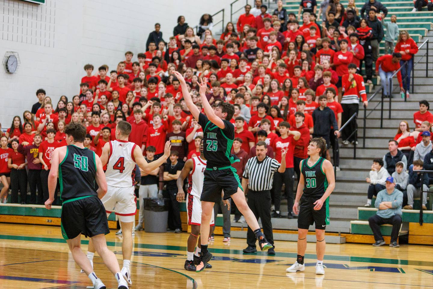 York's Joseph Lubbe shoots a three pointer against Glenbard East at the Class 4A Bartlett Sectional Final on Friday, March 6,2026 in Bartlett.