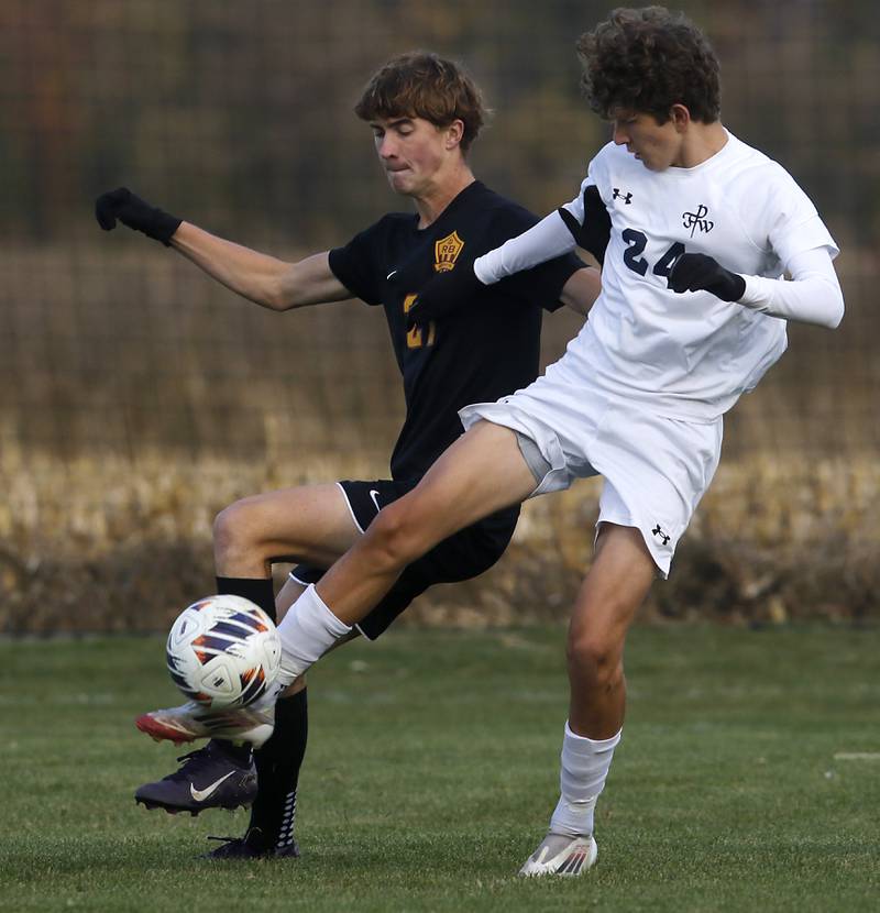 Richmond-Burton's Aidan Albert battles with F.W. Parker's Raffaello Franco for control of the ball during an IHSA Class 1A Johnsburg Sectional semifinal match on Oct. 28, 2025, at Johnsburg High School.