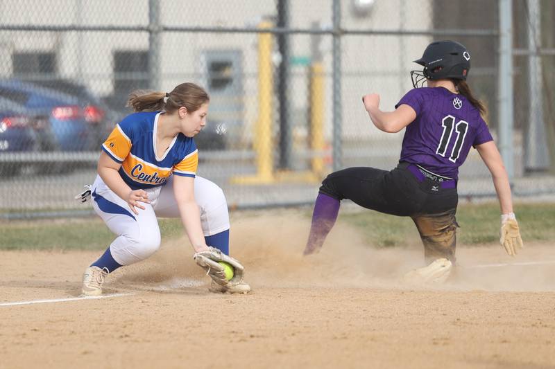 Wilmington’s Molly Southall steals third ahead of the tag by Joliet Central’s Cameron Salazaron Tuesday, March 12 in Joliet.