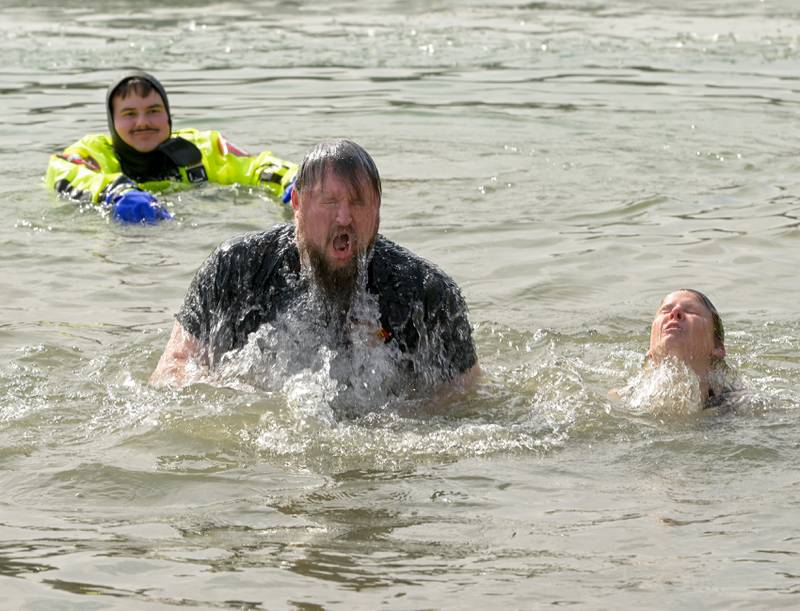 A participant in the Kendall County Law Enforcement Torch Run Polar Plunge for Special Olympics Illinois athletes at Silver Springs State Park emerges from a full plunge on Sunday, Mar 1, 2026 in Yorkville.