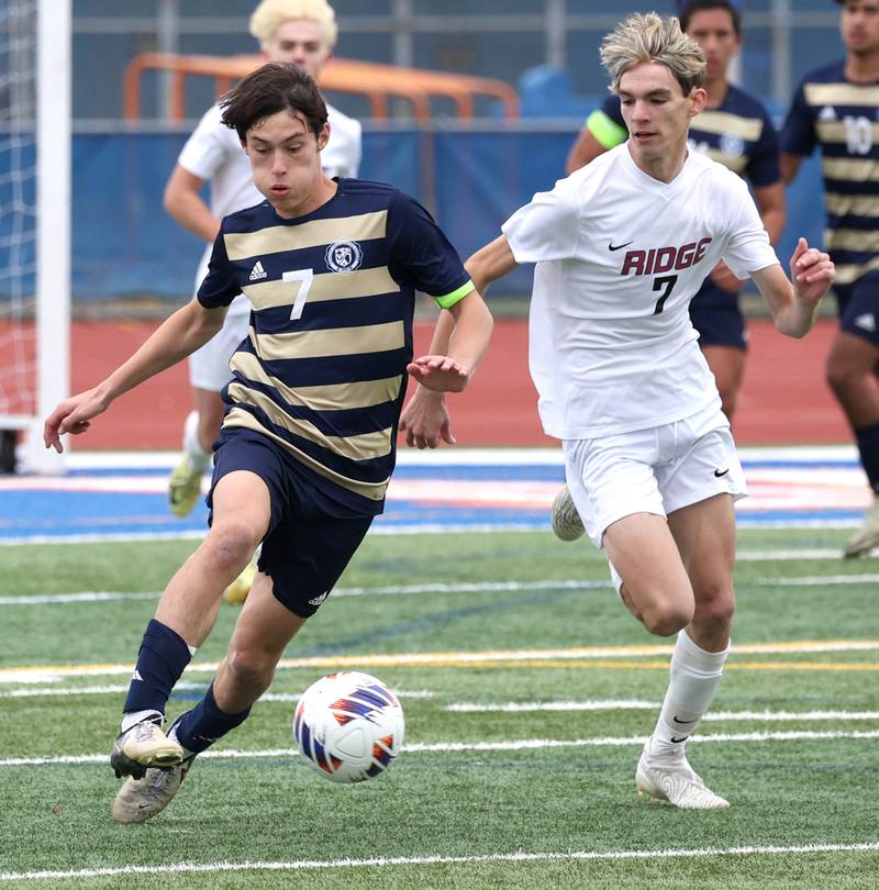 Lemont's Tyler Chrisman and Prairie Ridge's Bryce Frits chase down a loose ball Saturday, Nov. 9, 2024, during their Class 2A state third place game at Hoffman Estates High School.