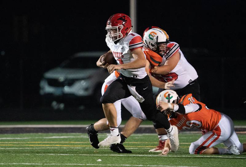 Yorkville's Nate Kraus (1) carries the ball on a keeper for a gain against Plainfield East during a high school football game at Plainfield East High School in Plainfield on Friday, Sep 17, 2021.