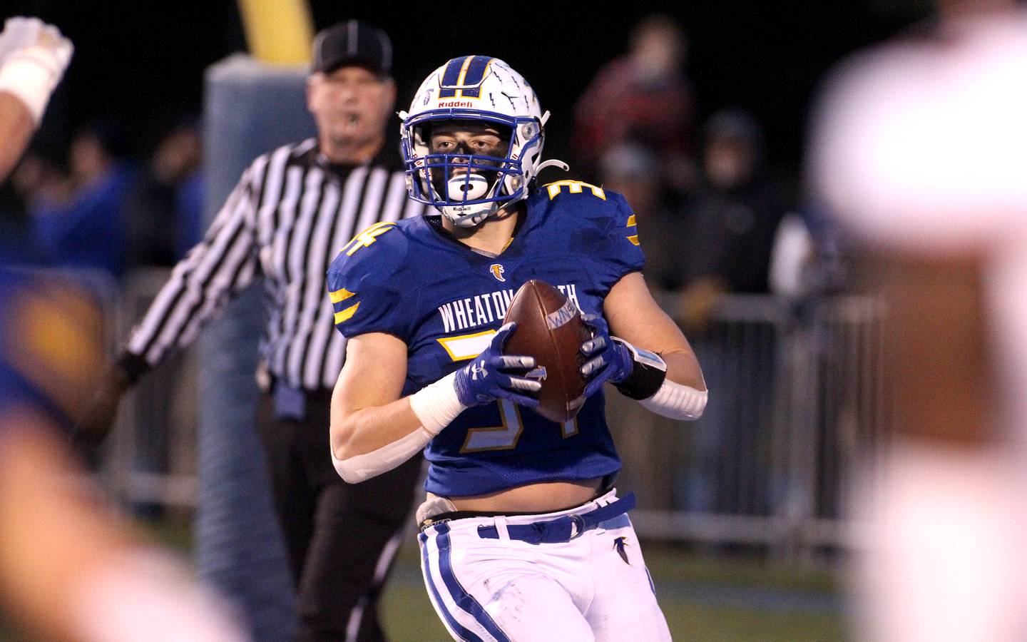 Wheaton North's Rex Kroger scores a touchdown during a Class 7A semifinal against Brother Rice at Wheaton North on Saturday, Nov. 20, 2021.