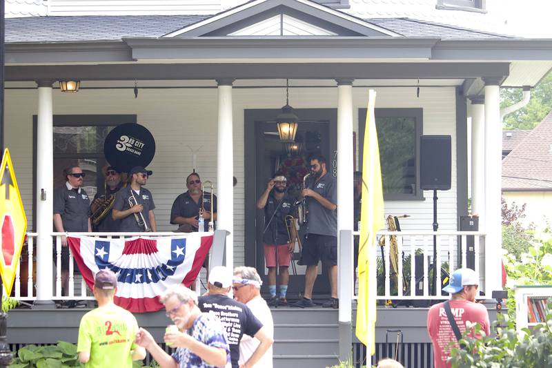 3rd City Brass Band in the 700 block of Western Avenue in Joliet for the Porch and Park Music Fest on Saturday, Aug. 16, 2025.