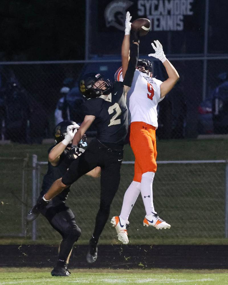 Sycamore's Luke Howieson knocks down a pass intended for Mahomet-Seymour's Owen Seymour during their game Friday, Sept. 12, 2025, at Sycamore High School.