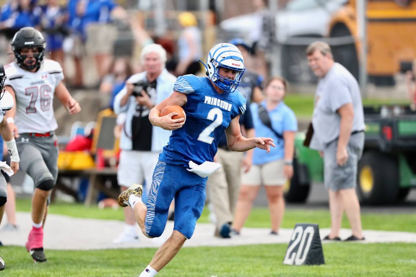 Princeton quarterback Teegan Davis scores an 84-yards against Orion Thursday night at Bryant Field. The Tigers won 60-20.