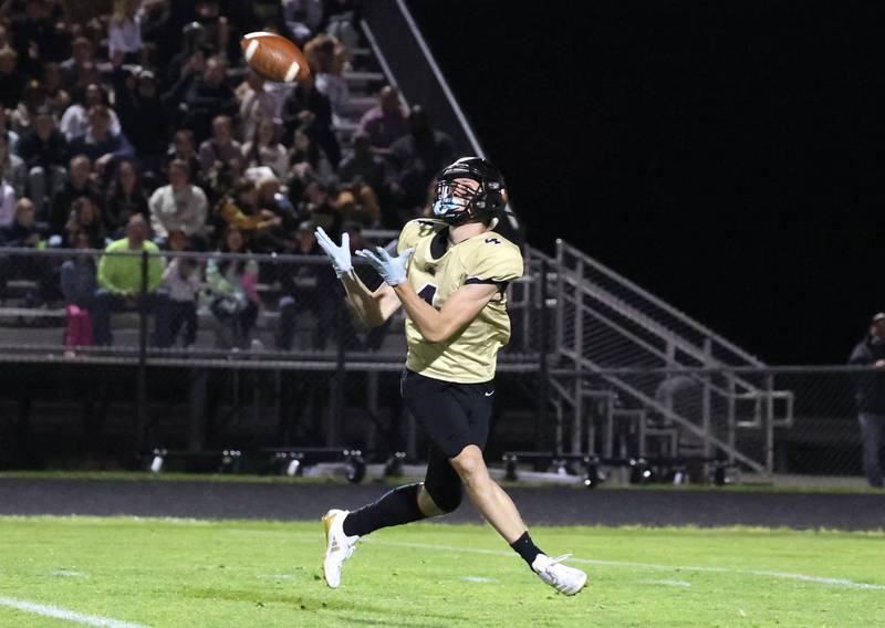 Sycamore's Aidan Wyzard gets behind the Ottawa secondary for a touchdown reception during their game Friday, Sept. 27, 2024, at Sycamore High School.