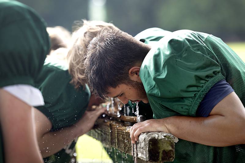 Though Tuesday, July 16, 2024, was much milder than it has been in temperature, frequent water breaks are taken at the Rock Falls football camp.