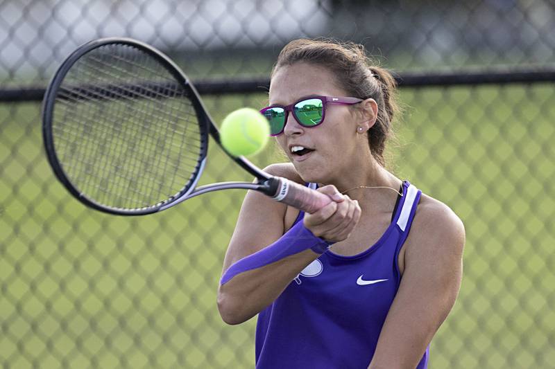Dixon’s Addison Arjes plays a shot against Sterling’s Layla Tablante Thursday, Sept. 28, 2023 in Sterling.
