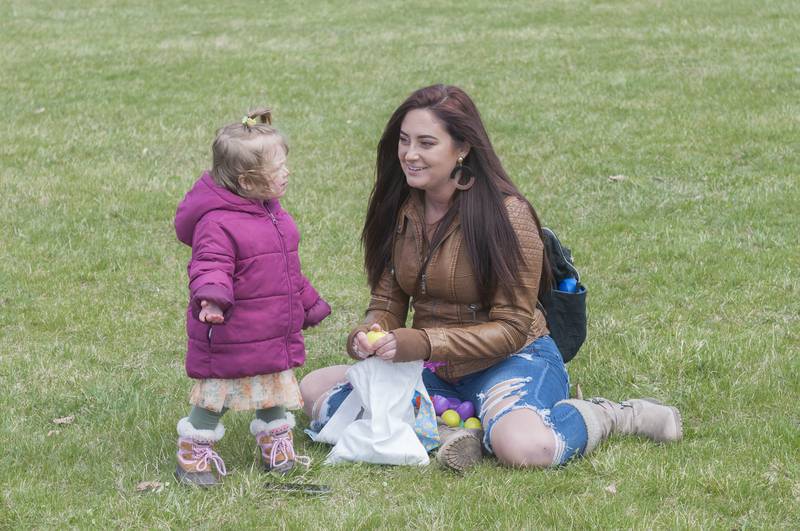Jessika Schwiesow and daughter Scarlette, 2, drove in from Sycamore to take part in this unique egg hunt, Saturday, April 16, 2022 in Dixon.