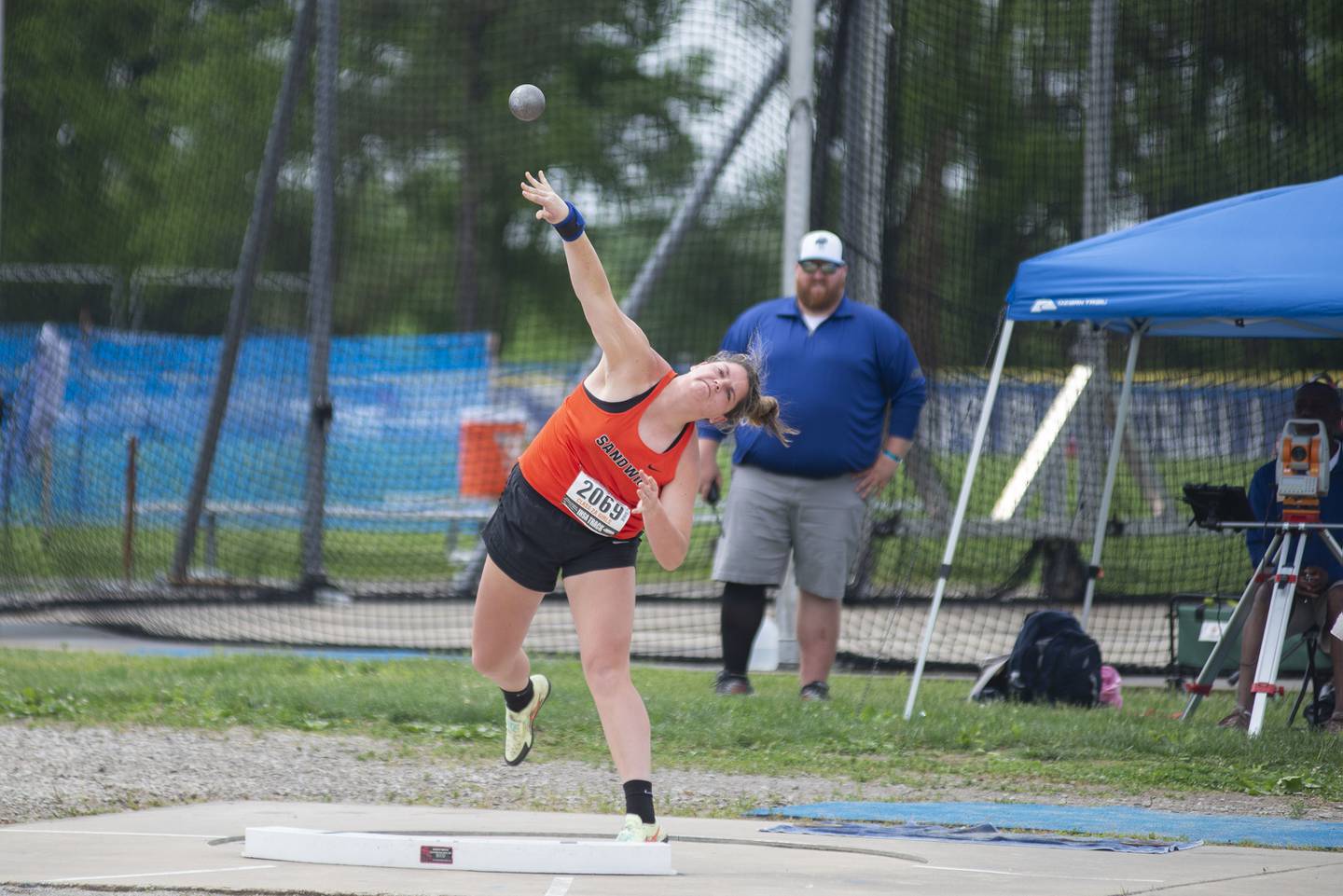 Claire Allen of Sandwich fires off the shot put during the IHSA girls state championships, Saturday, May 21, 2022 in Charleston.