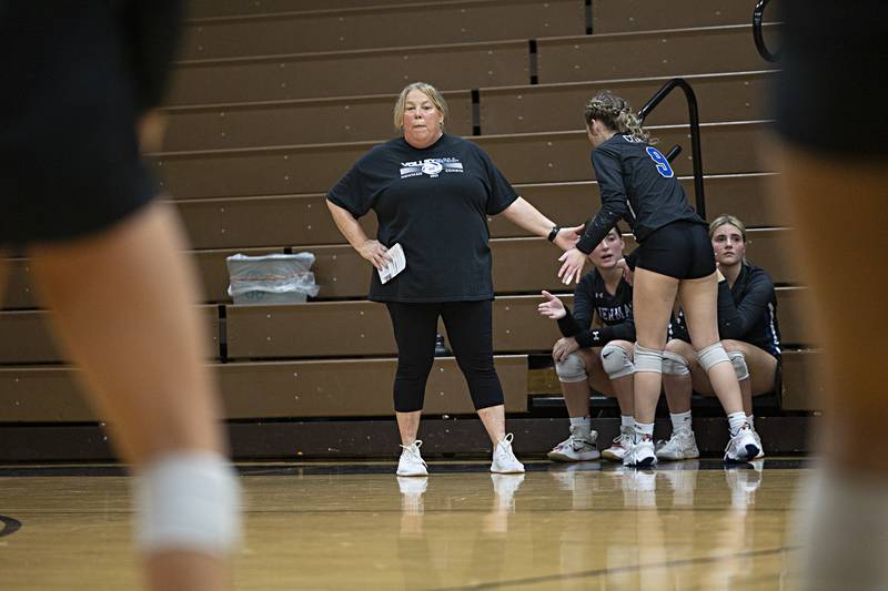 Newman coach Debbi Kelly looks on late in the game against Rock Falls Thursday, Oct. 26, 2023 in the class 2A regional finals at Riverdale.