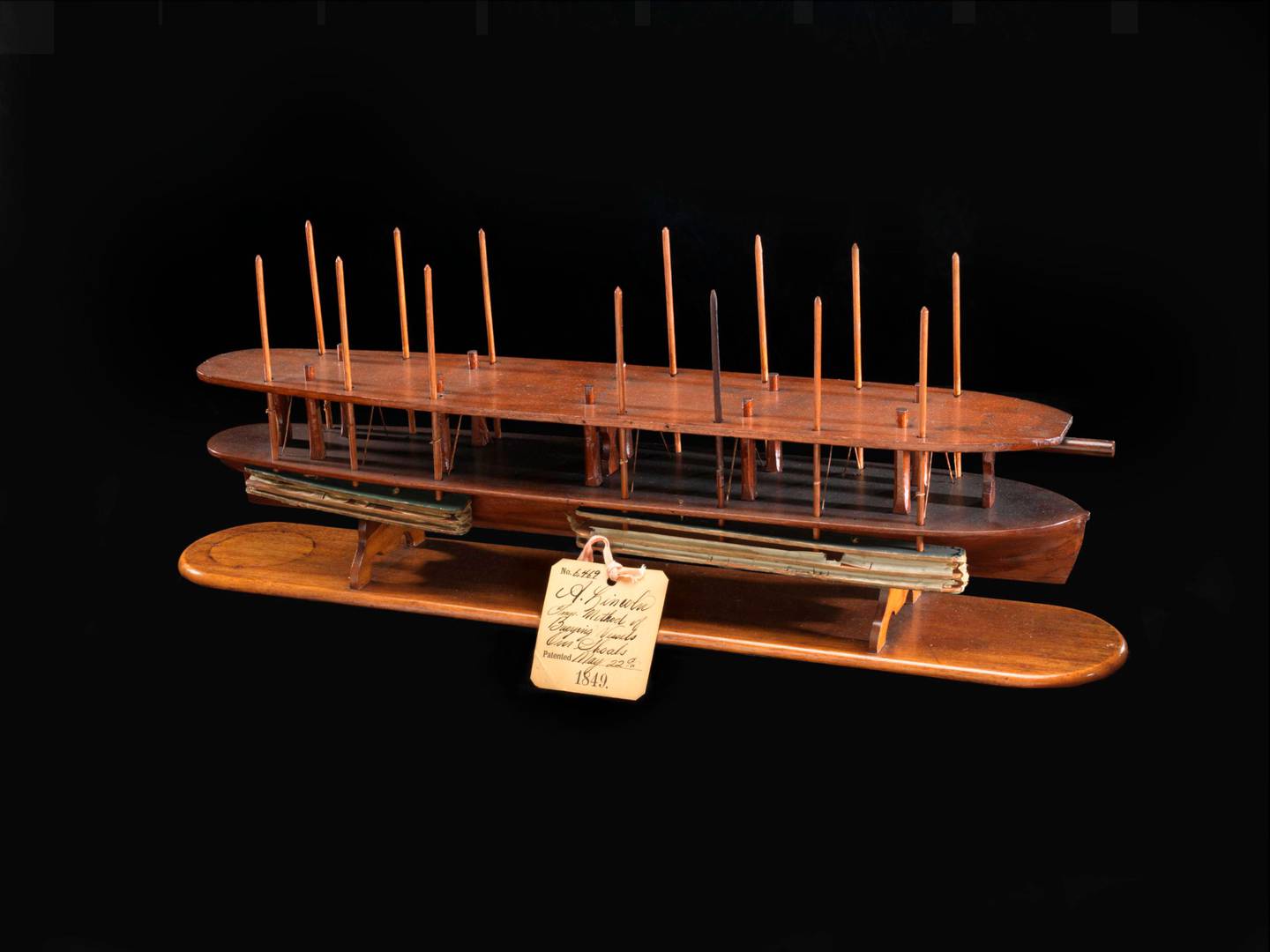 In a woodworking shop near his Springfield office, Abraham Lincoln created a 4-foot scale model to illustrate his idea of floating a trapped ship off an obstruction.