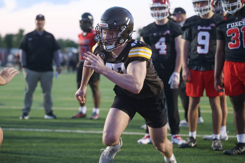 Joliet Catholic’s Vince Skedel runs a defensive drill at the IHSA Southwest Suburb Showcase combine on Thursday, May 7, 2026 at Plainfield North High School.