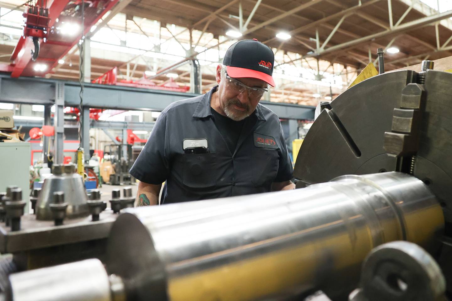 Jim Oltmanns, a mechanic at Joliet Electric Motors for 34 years works on a shaft motor on Wednesday, May 1, 2024.