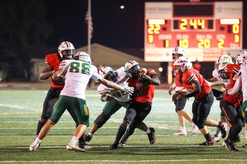 Bradley-Bourbonnais' Kyren Edmon is tackled on the run by Waubonsie Valley's Aiden Hughes during the Boilermakers' 35-6 victory over Waubonsie Valley Friday, Sept. 12, 2025.
