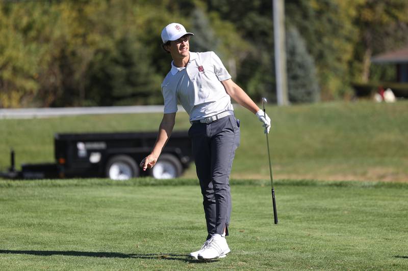Wheaton Academy’s Owen Coniaris uses his body to guide the ball on his drive off the 15th hole in the Class 2A Lemont Boys Golf Sectional on Monday, Oct. 7, 2024 at Wedgewood Golf Course in Lemont.