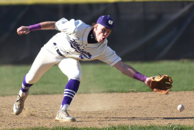 Wilmington's Cooper Holman attempts to field a ground ball during a home game against Herscher Tuesday, April 7, 2026.