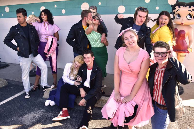 (L to R): Kevin Soto (Kenickie), Maggie Komes (Rizzo), Grace Preboy (Sandy), Joey Fatigante (Sonny), Trevor Shingler (Danny), Hailey Rose Kasky (Marty), Zoe Smith (Frenchy), Riley Nevin (Roger), Stephen Byers (Doody), and Kaylee Groves (Jan)