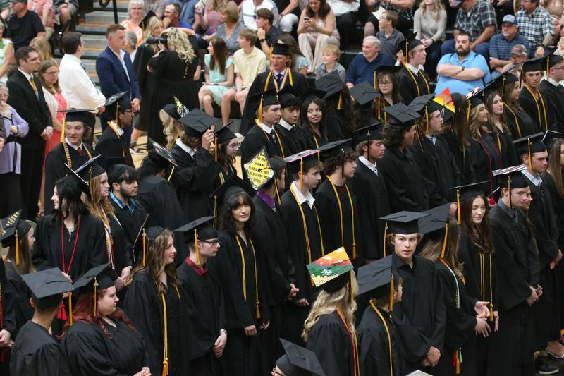 Putnam County graduates stand during the Class of 2023 graduation ceremony on Sunday, May 21, 2023 at Putnam County High School.