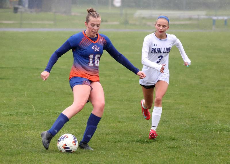 Genoa-Kingston's Ally Poegel scores from distance in front of Rockford Christian's Paige Giardina Tuesday, May 20, 2025, during their Class 2A regional final game at Rockford Christian High School.